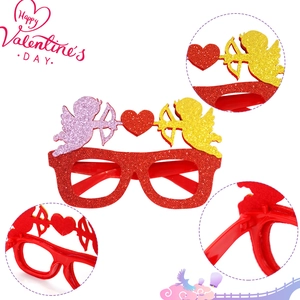 Sparkly red Valentine heart party glasses featuring Cupid and a Happy Valentine's Day sign