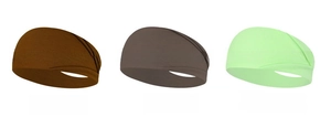 Detalle de cintas de yoga en color café y verde manzana con diseño cruzado elástico