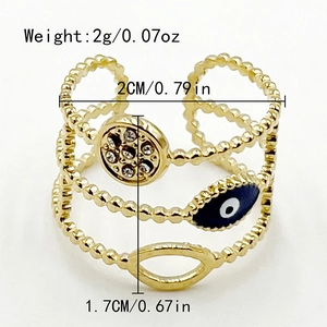 Detail view of gold beaded ring with blue evil eye charm and size specifications