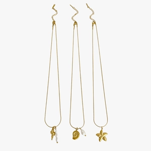 Three gold stainless steel necklaces with seashell, starfish charms and freshwater pearls