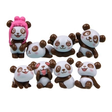 Set of eight adorable panda figurines in various playful poses for desk decoration