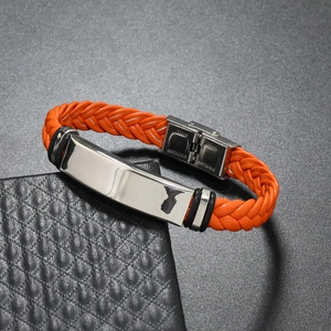 Detail of orange braided leather bracelet with polished stainless steel clasp and ID plate
