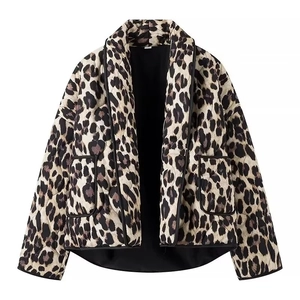 Detail showing the leopard print quilted jacket texture and large front pockets