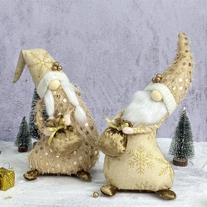 Sequin Christmas Gnomes set in warm gold and beige with snow scene decoration