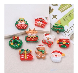 Detailed set of assorted Christmas resin charms including Santa, gingerbread man and reindeer
