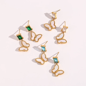 Three pairs of gold butterfly drop earrings with emerald, white, and blue zircon crystals