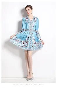 Detailed view of light blue floral chiffon mini dress with V-neck and matching waist belt