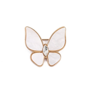 Elegant gold-tone butterfly brooch with white mother-of-pearl wings and marquise crystal