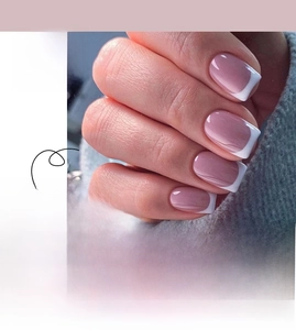 Detailed close-up of JP2157 French style press-on nails with white tips and pink base