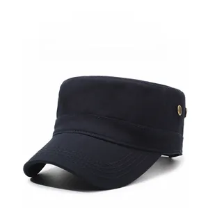 Detail of navy blue flat top military hat showing side brass button and metal Jeans logo