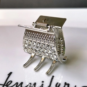 Sparkling silver metal hair claw clip with square hollow design and inlaid rhinestones