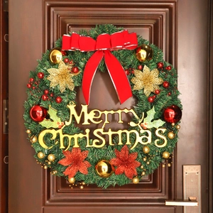 Classic 40cm Christmas wreath with red bow and gold Merry Christmas sign on a door