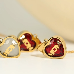 Gold MOM heart necklaces with cubic zirconia birthstones for women shown from the front
