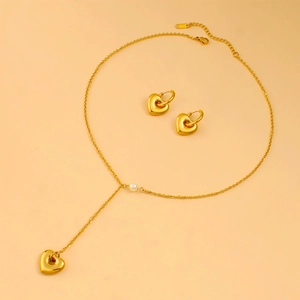 Elegant gold heart pendant necklace with white pearl and matching earrings set for women