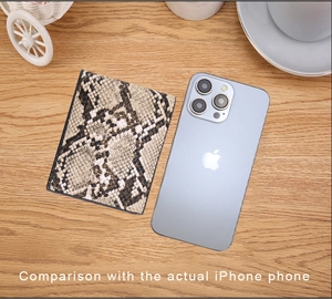 Detailed comparison of snakeskin texture card holder size next to an iPhone