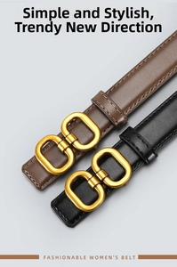 Detail of elegant women's thin leather belts featuring golden double-ring metal buckles