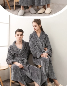Detailed texture of dark grey thick fleece bathrobes with classic belted waist for couples