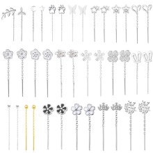 Collection of long tassel drop earrings featuring star, moon, and floral designs