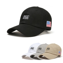 Detail view of USA embroidered baseball caps in black, white, grey and khaki colors