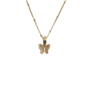 Detailed close-up of a gold-plated butterfly pendant with sparkling cubic zirconia stones