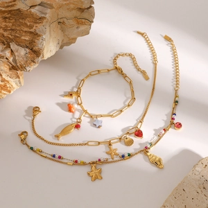 Golden 18k stainless steel ocean charm bracelets with sea stars, shells and beads