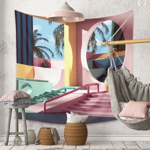 Detail view of Bohemian wall tapestry featuring surreal pink architecture and palm trees