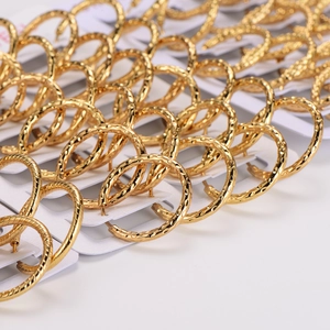 Golden hoop earrings with textured finish and vintage hammered design for women