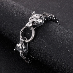 Detailed view of punk wolf head bike chain bracelet in vintage stainless steel finish