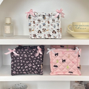 Quilted cotton fabric storage basket with cute animal prints and ribbon bow detail