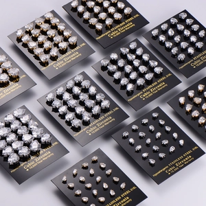 Detailed view of teardrop cubic zirconia earrings on 316L stainless steel display cards