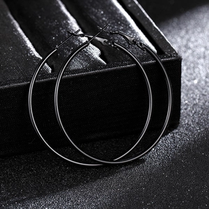Sleek black stainless steel hoop earrings for men and women with a minimalist polished finish