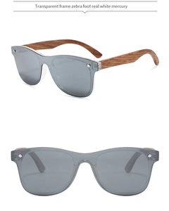 Detail view of transparent smoke frame sunglasses with zebra wood grain temples and mercury lenses