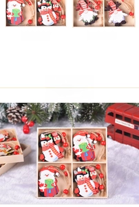 Close-up of wooden Christmas ornaments with Santa and snowman in a wooden gift box