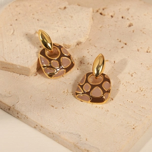 French vintage style leopard print enamel earrings with geometric gold copper accents