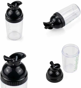Detailed macro view of 8 OZ kitchen squeeze bottle with measurement scale and flip cap