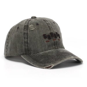 Detail of dark gray washed cotton baseball cap with red 3D BRERU embroidery and distressed holes