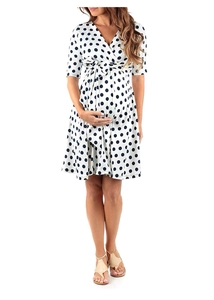 Detail of V-neck maternity dress with classic polka dot pattern and waist tie design