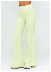 Detail showing high-waisted mint green yoga pants with contrast flatlock stitching seams