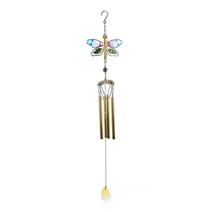 Detail of colorful dragonfly wind chime with golden metal tubes and glass wings