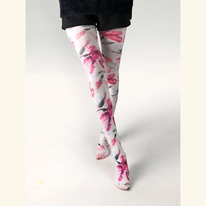 White sheer pantyhose with pink floral pattern worn by model against white background