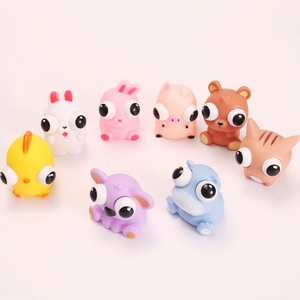 Variety set of 8 colorful squeeze stress relief toys with pop-out eyes in animal shapes