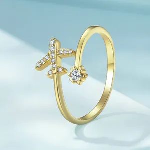 Golden S925 sterling silver airplane open ring with sparkling cubic zirconia pavé