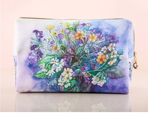 Detail of floral printed PU leather makeup bag with colorful watercolor flower patterns