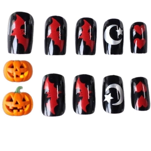 Halloween press-on nails with black base, red bats, silver moon stars and pumpkin charms
