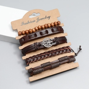 Detail of 4-piece brown leather bracelet set with wooden beads and Tree of Life pendant