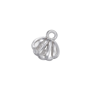 Detailed view of silver hollow-out shell pendant with micro-pave cubic zirconia accents