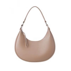 Chic taupe leather half moon handbag with silver hardware and adjustable shoulder strap