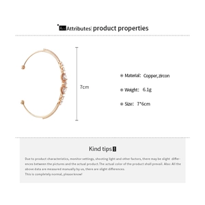 Detailed size specifications of the gold zircon heart bangle with 7x6cm dimensions