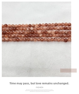 Macro detail of orange sunstone beads showing natural texture for DIY jewelry making