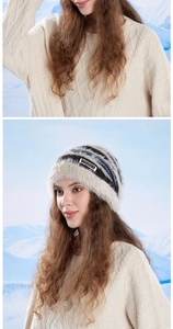 Close-up of striped knit winter hat with fluffy beige faux fur trim and JOYLORD label
